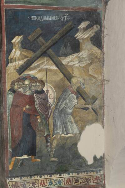 Nicodemus carries the cross