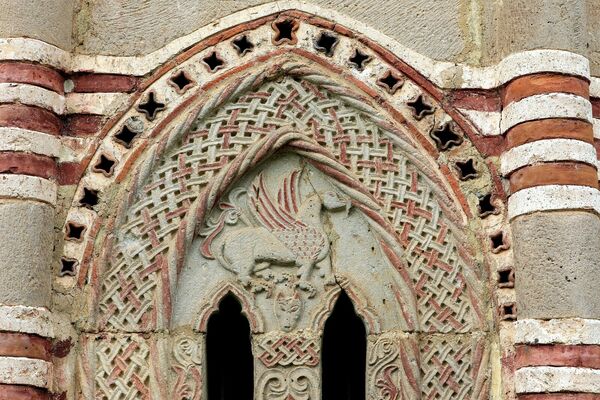 Bifora on the South chantry with a Representation of a Griffin, detail