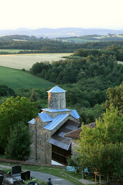 View of the Church and the Slopes of the Rudnik Mountain