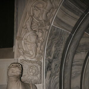 A sculpture of the lioness on the capital on the north side of the portal